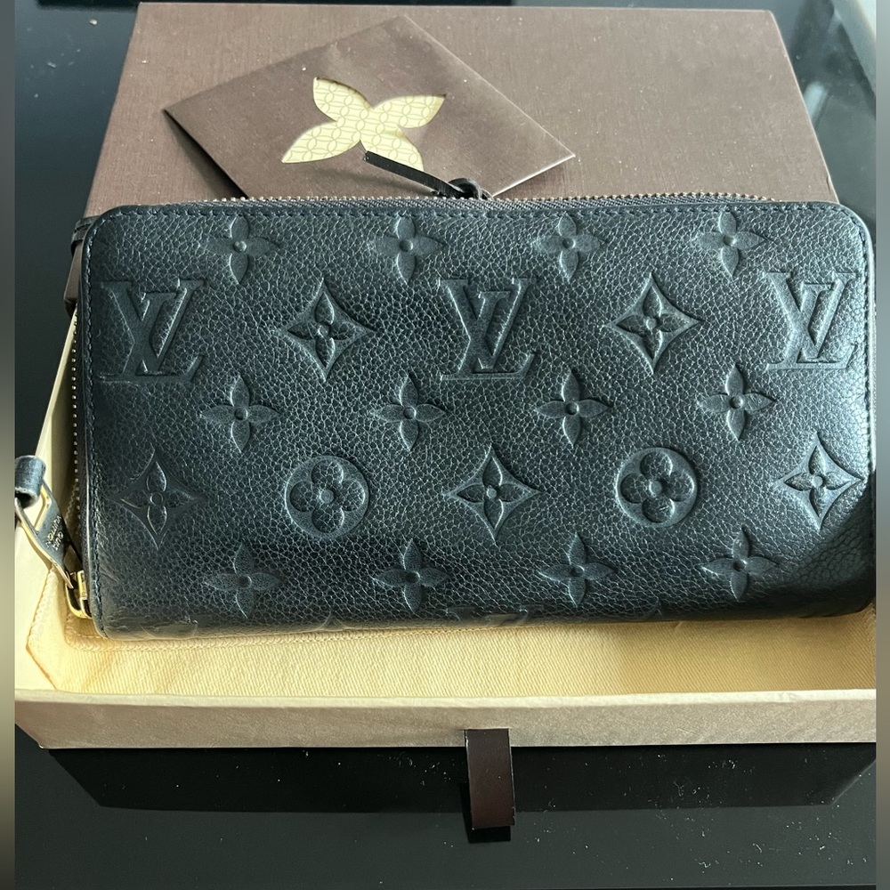Louis Vuitton black secrete monogram large zippy wallet